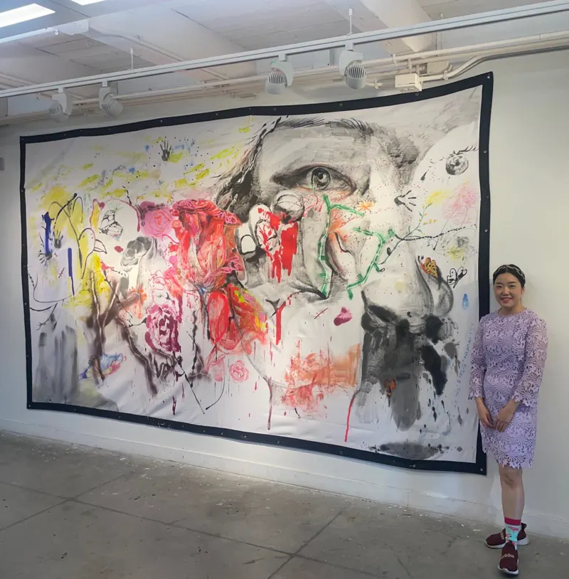Ara Ko with her artwork